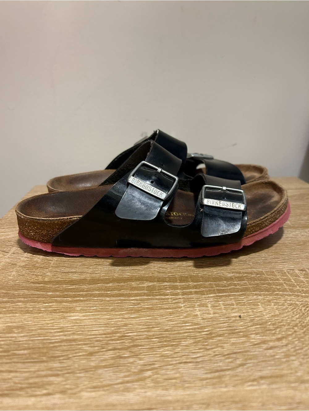 Birkenstock Arizona Two-Strap Sandals in Black with Pink Outsole